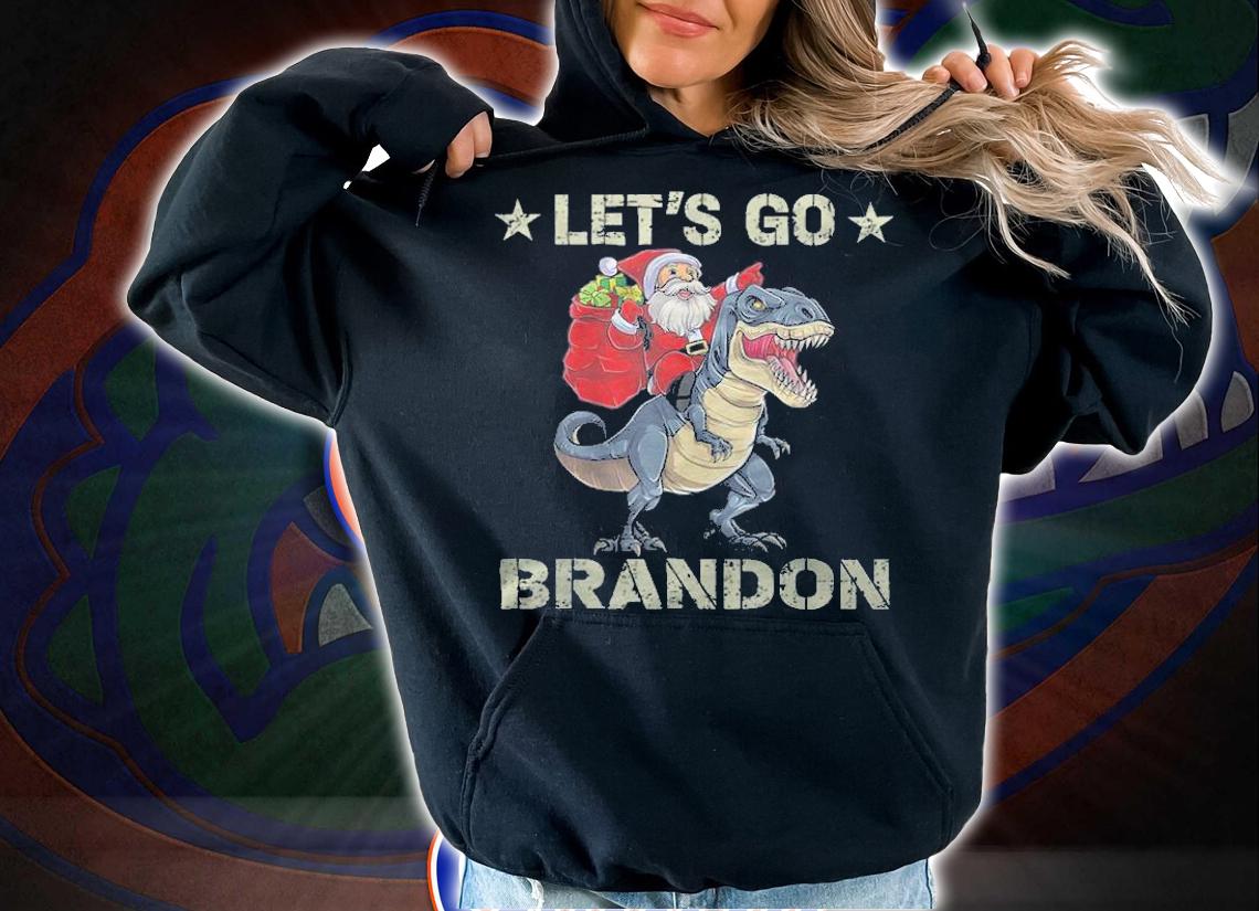 Premium let's Go Brandon American Flag Impeach Biden Santa Claus Ridding Dinosaur T-Shirt t-shirt