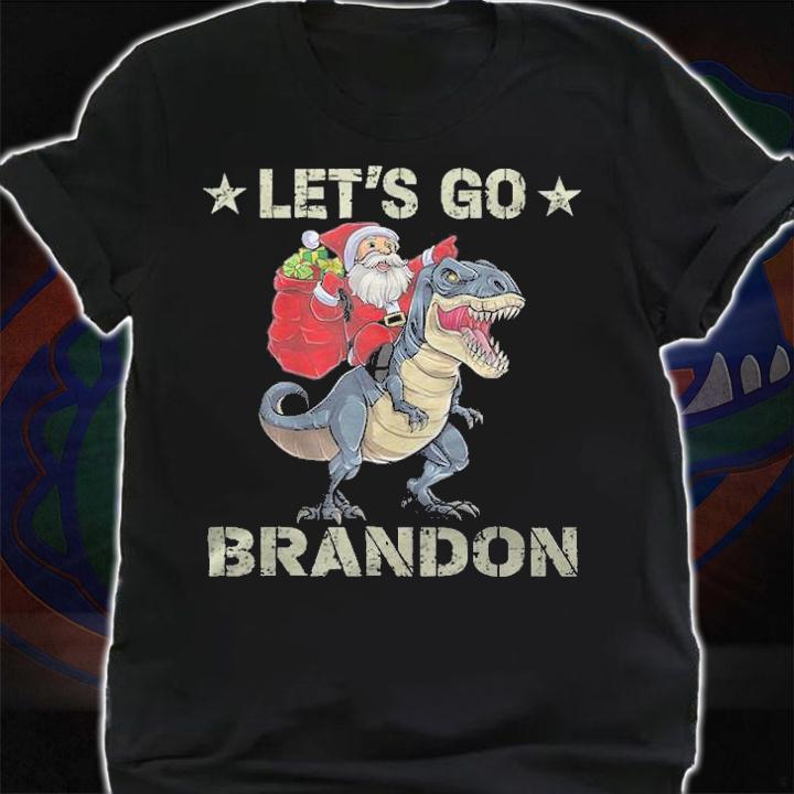 Premium let's Go Brandon American Flag Impeach Biden Santa Claus Ridding Dinosaur T-Shirt t-shirt