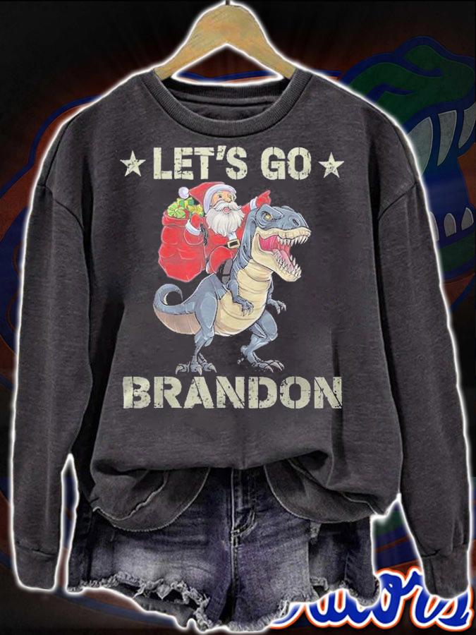 Premium let's Go Brandon American Flag Impeach Biden Santa Claus Ridding Dinosaur T-Shirt t-shirt