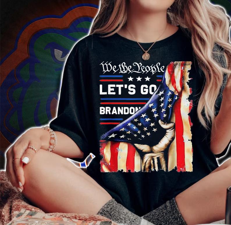 We The People Let's Go Brandon Fist USA Flag Vintage T-Shirt woman shirt